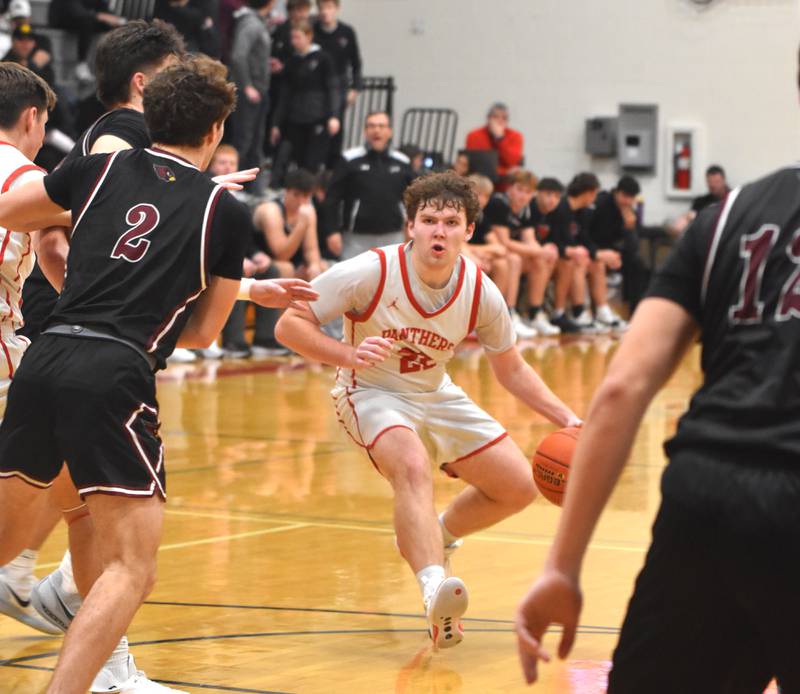 Nate Carroll looks for an opening to the basket Tuesday at home against Clarinda. Carroll knocked down two 3-pointers in the fourth quarter.