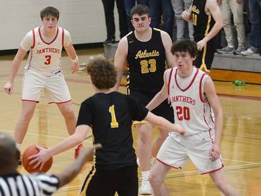 Late surge lifts Panthers over Trojans