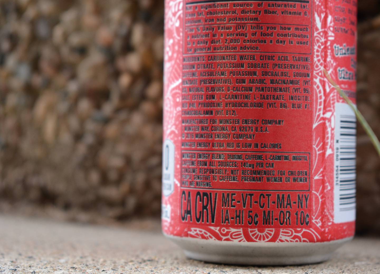 A label on a beverage container details the five cent deposit required for sale.