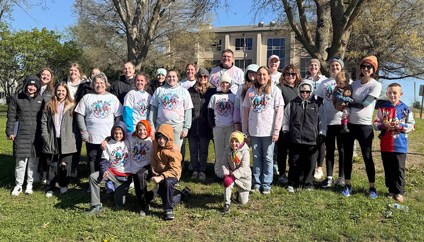 Southwest Valley color run participants and volunteers after the race. Medals were given to the fastest and most colorful participants in the run and walk categories.