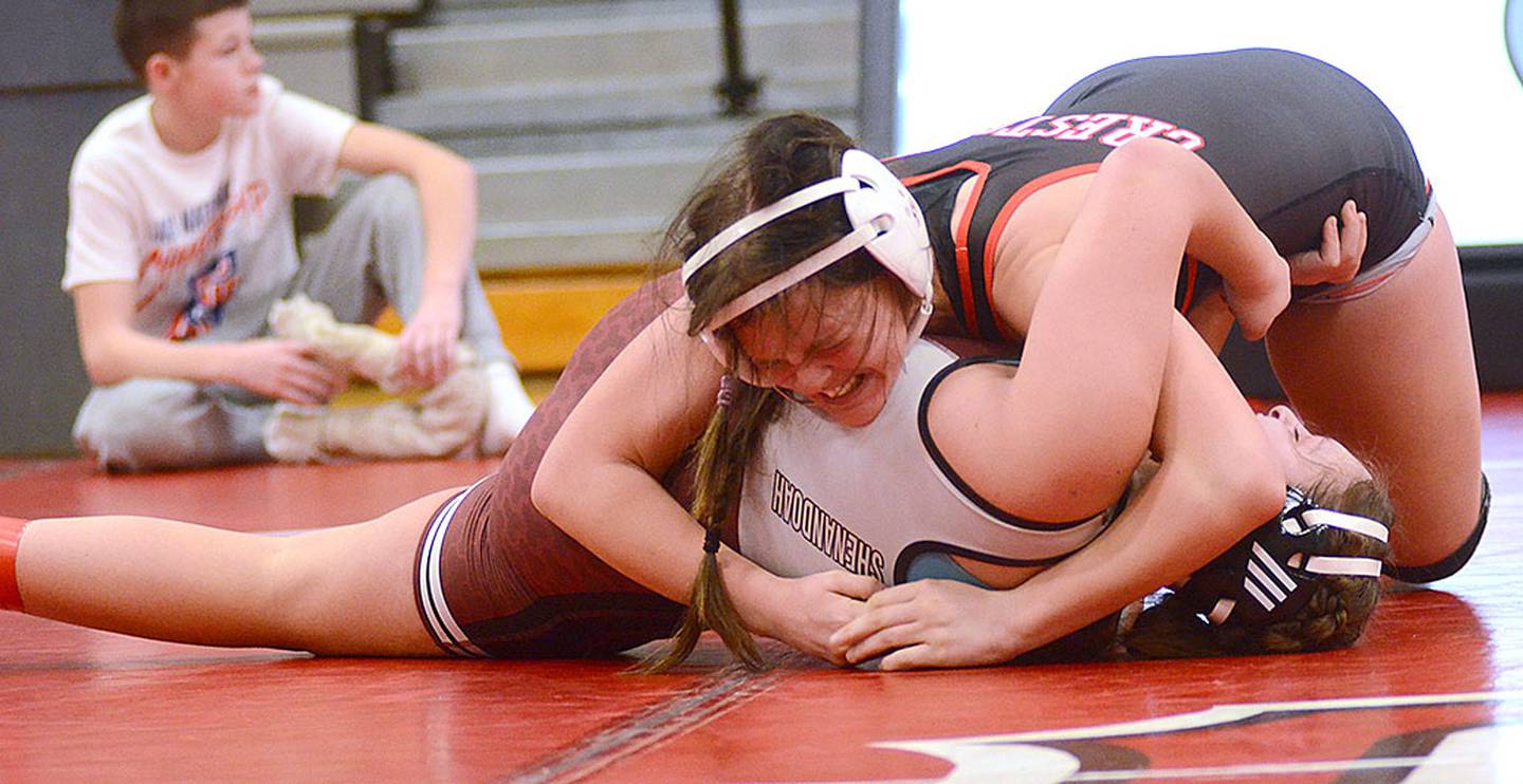 Kora Lohoff works for a pin against Kyndil Rystrom of Shenandoah. Lohoff placed third at 155 pounds.