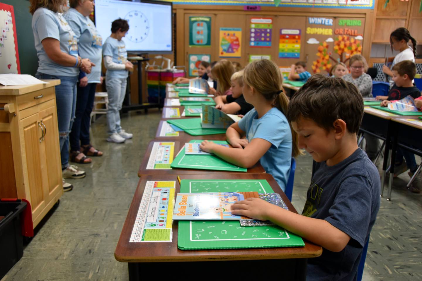 Dr. Krogstad donated books to second grade students in Creston, Diagonal and Mount Ayr.