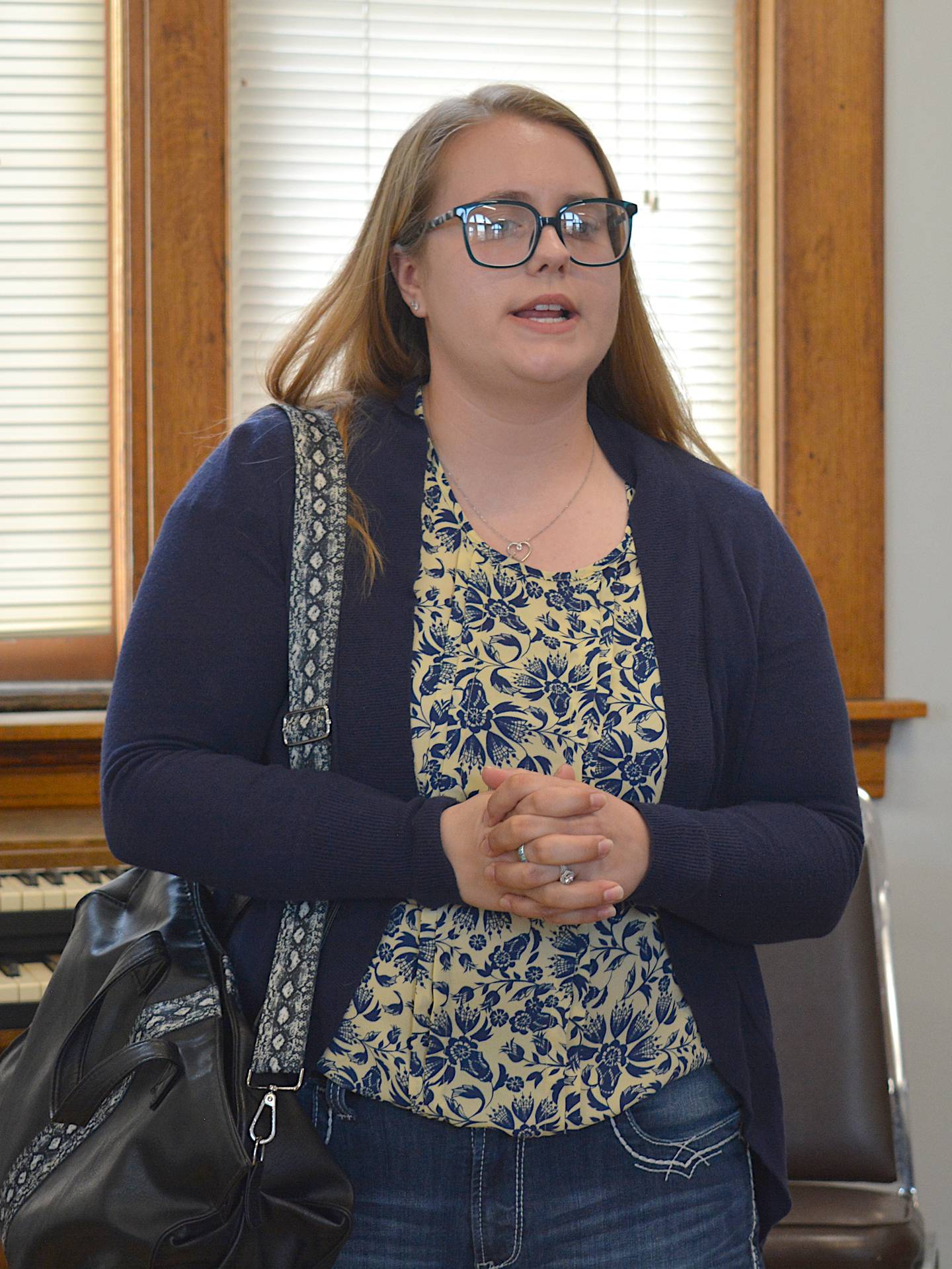 State Representative Devon Wood speaks with Iowans during Saturday's legislative coffee session.
