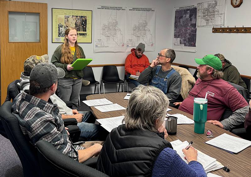 The Greenfield City Council listens to a report from Library Director Danica Clayton in a recent meeting.