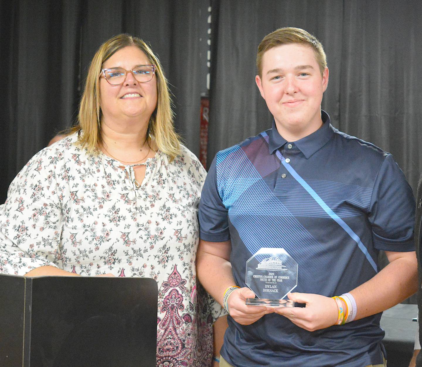 Creston Chamber of Commerce President Danna Buls joins 2025 Youth of the Year winner Dylan Dornack.