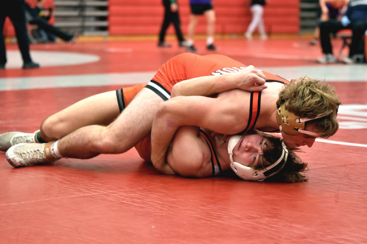 Will Bolinger (165) holds Chase Ragaller of Carroll to the mat in the third-place match. Bolinger won the match in a second-period pin.
