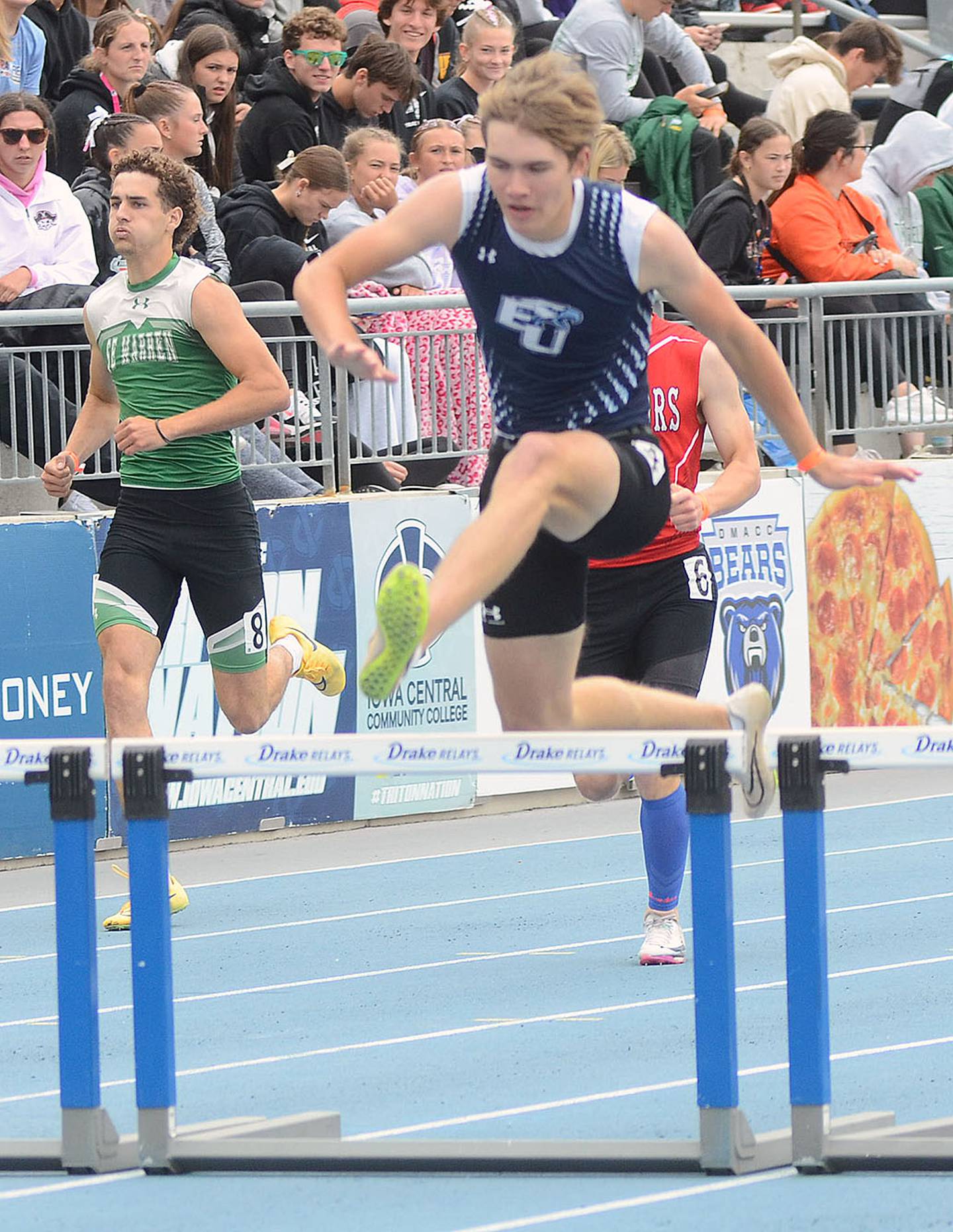 East Union's Paul McNeill clears a hurdle near the end of the Class 1A 400 meter hurdles. McNeill was 10th in 55.75.