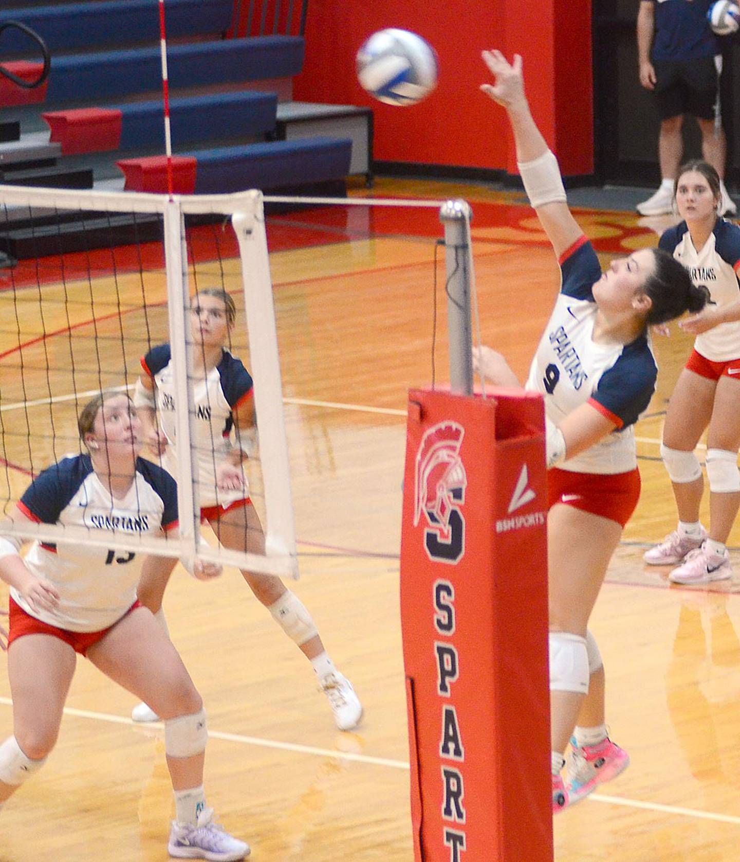Southwestern's Addison Martin sends an attack to the Northeast court.