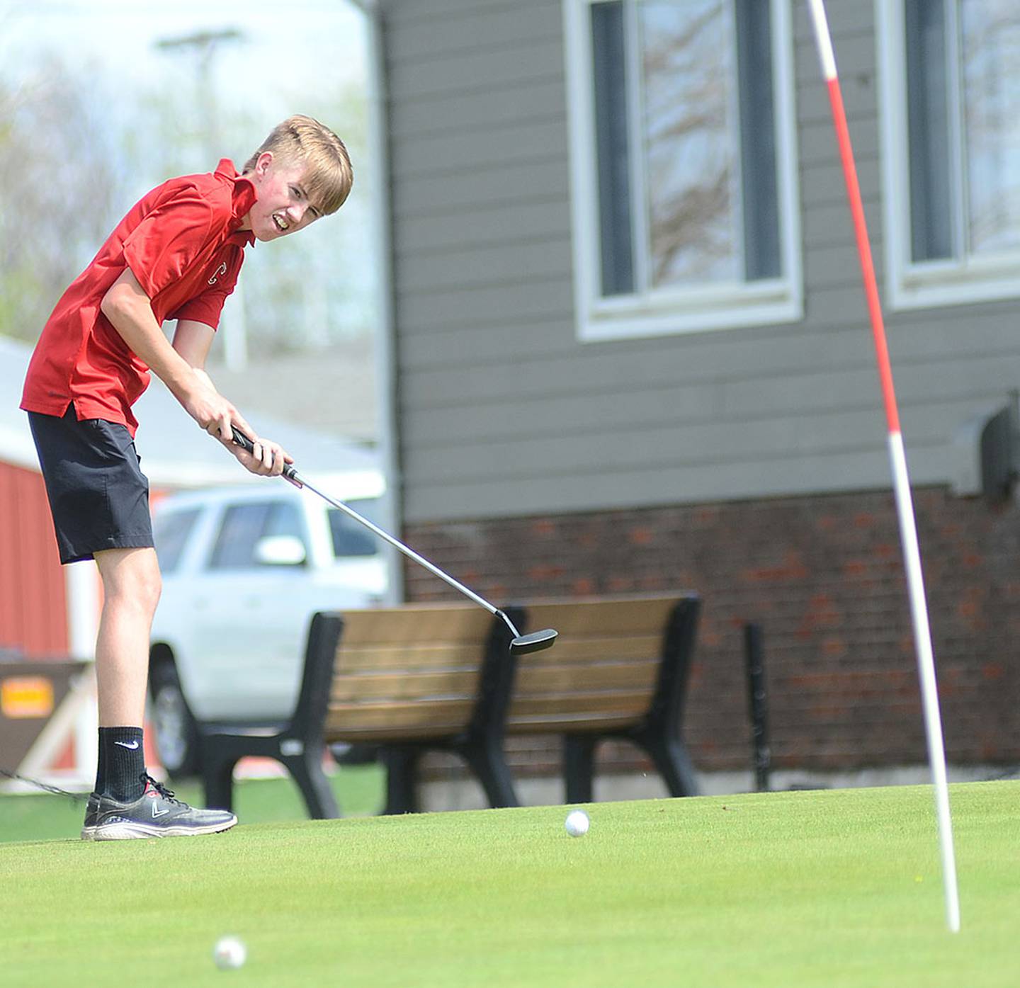 Garrett Troutwine of Creston putts on No. 3 at Crestmoor Tuesday. Troutwine shot 45-47 — 92.