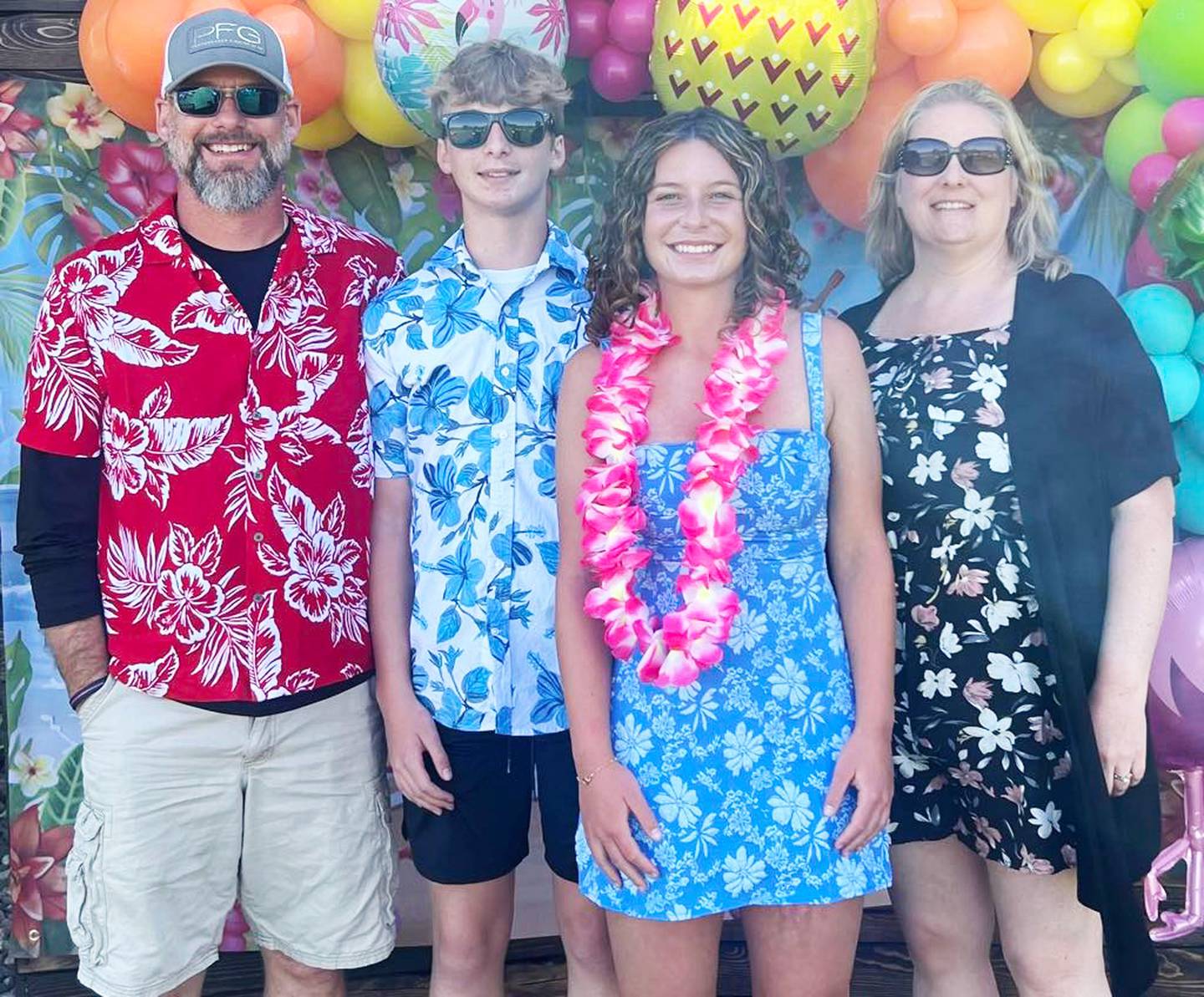From left, Ryan Burwell with kids Wyatt and Olivia and wife Heather.