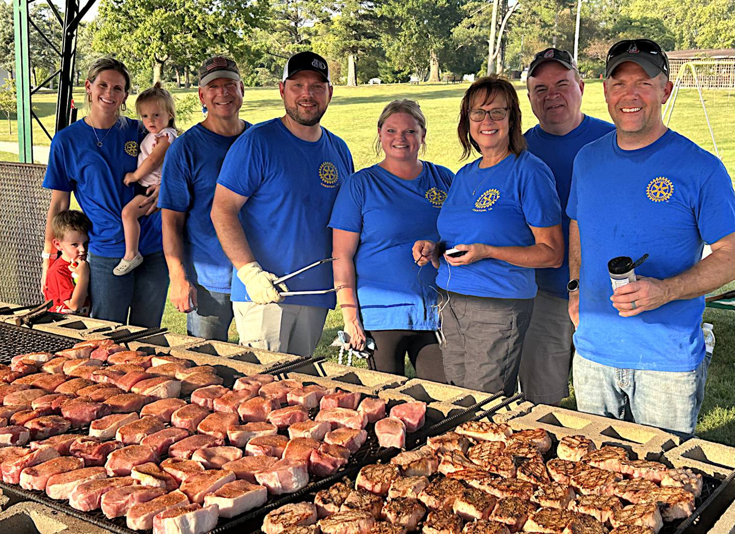 Creston Rotary Club members Madison Peterson, Deron Stender, Adam Snodgrass, Chantel Kljech, Linda Landers, John Van Nostrand and Wayne Pantini cook about 1,000 pork chops Sept. 19 during the annual pork chop dinner provided by Rotary, Kiwanis and Lions clubs.