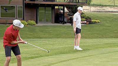 Spencer competes at district