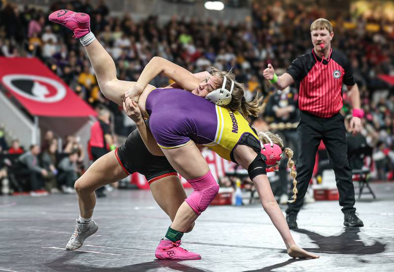 Karlie Kruse takes down Grace Patterson of Central Dewitt in the first round. Kruse went on to place fifth at 125.