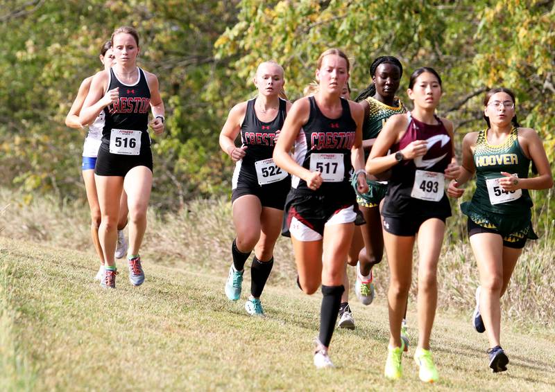 A pack of Panthers race together, placing second as a team ­— one point behind Des Moines Hoover. From left, Karter Clayton, Maylee Riley and Payton Davis.