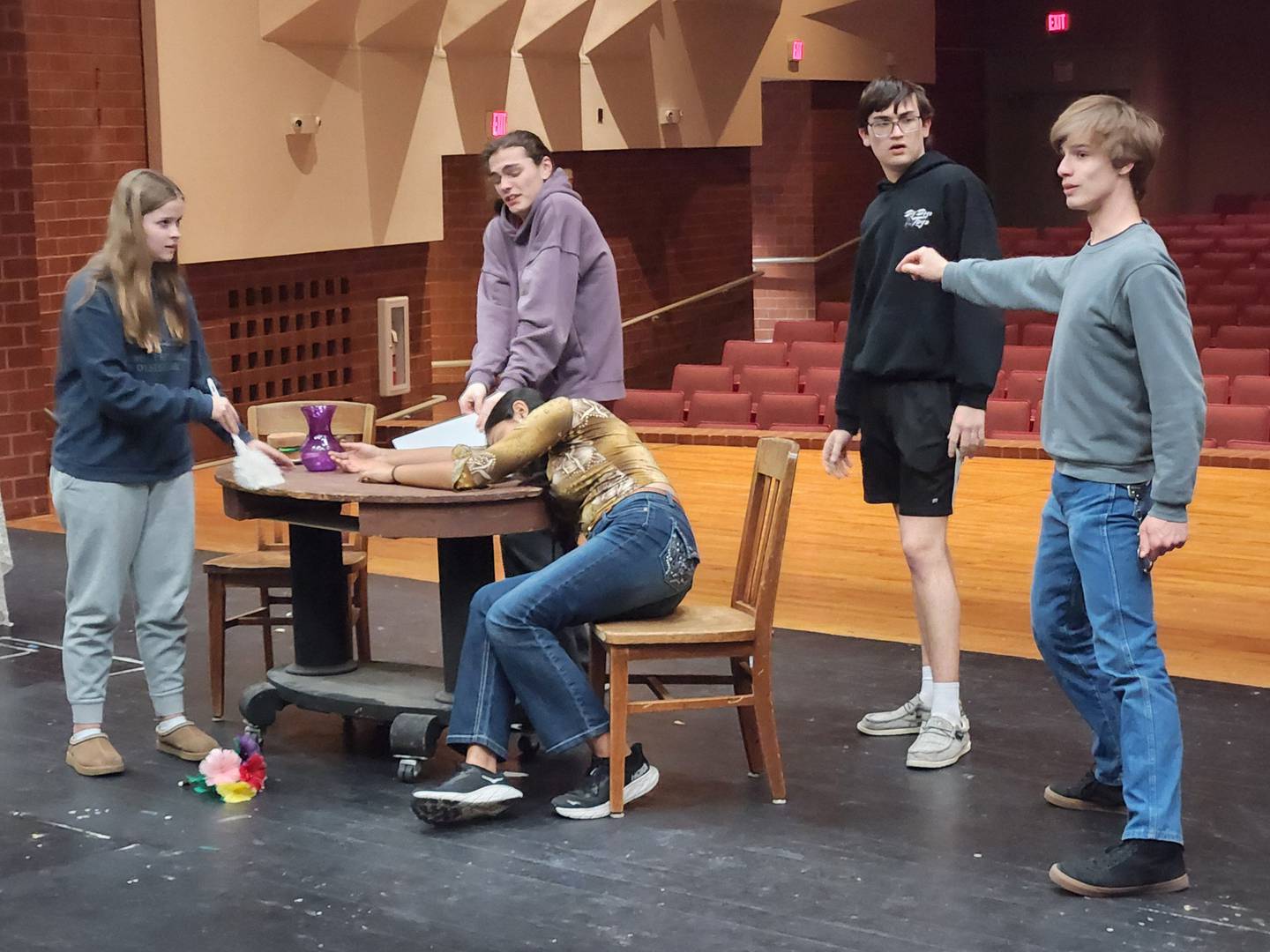 Cast members practice "The Least Puzzling Case." The show will perform at state speech competition on Saturday.