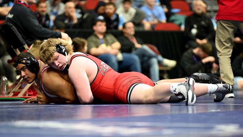 Gunner Martwick takes down Baylor Ferrira of Fort Madison before pinning him in the first period.