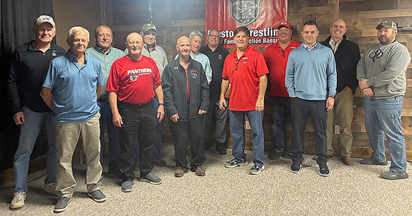 Members of the 1965, 1975, 1985 and 1995 Creston wrestling teams attending Saturday's banquet included from left, Mark Hayes, Denny Loudon, Terry Latham, Denny Abel, John Baker, Dennis Smith, Brian Kelley, Craig Taylor, John Walters, Chuck Hulett, Ryan Myers, Ryan Kinsella and Beau Hayes.
