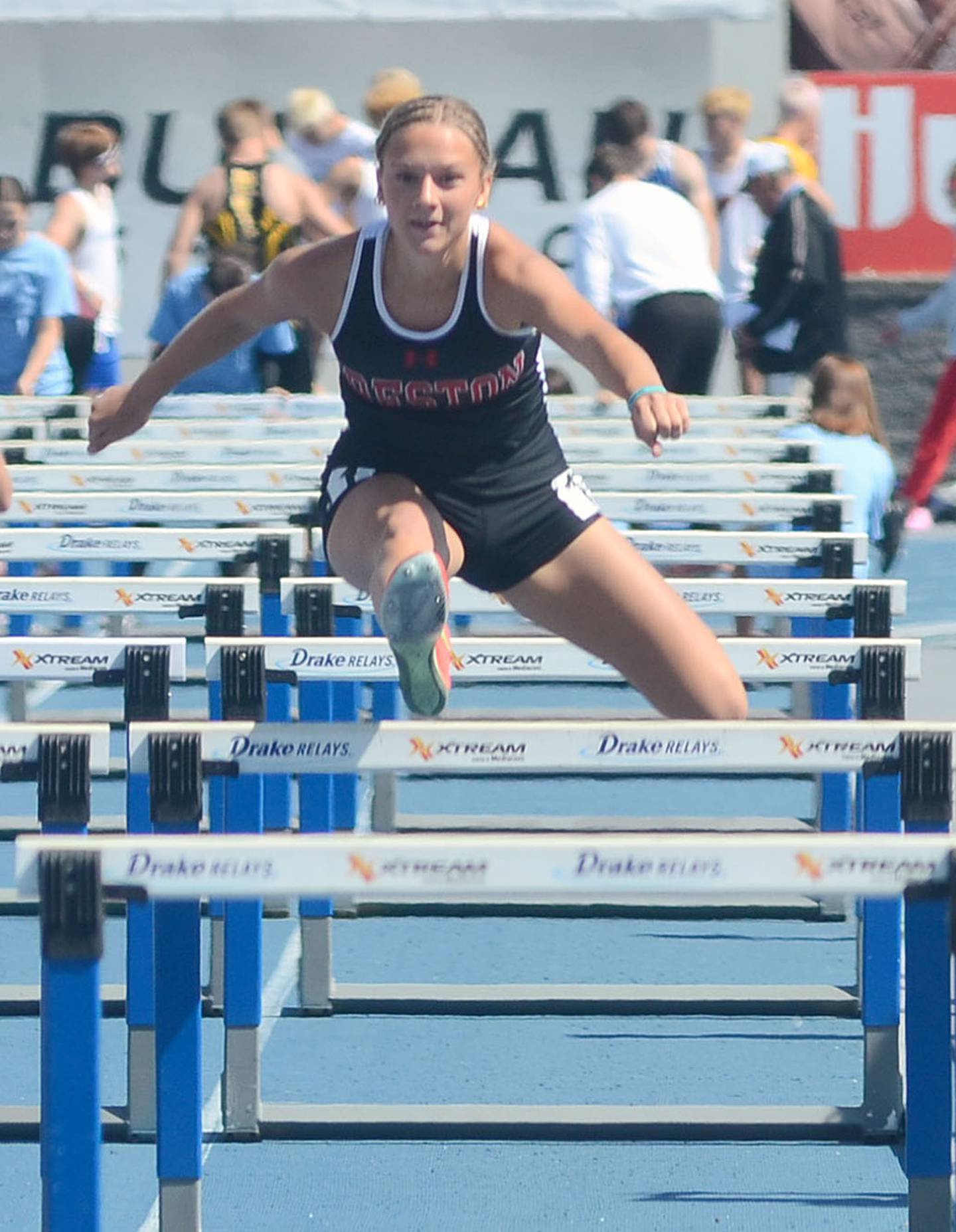 Creston junior Kadley Bailey runs the 100-meter hurdles at the state meet Friday. Bailey placed 24th in 16.65 and also ran on the team's shuttle hurdle relay and sprint medley relay at state.