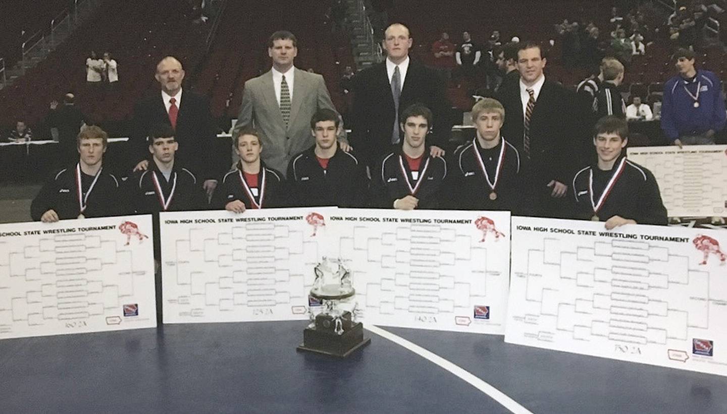 Creston wrestlers scored 139 points in second place at the 2008 traditional state tournament. Shown from left in front, state champion Kalab Evans, state runner-up Bret Kautz, state champion Andrew Long, state qualifier Jared Bevins, state champion Trent Tucker, fourth-place finisher Jesse Harris and state champion Quin Leith. Back row, assistant coach Matt Long, head coach Darrell Frain, assistant coach Drew Duff and assistant coach Nick Hemann.