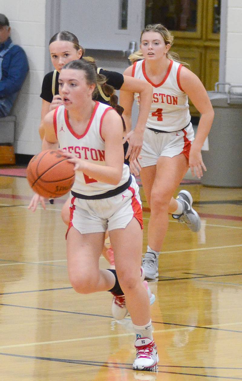 Creston point guard Hollynn Rieck leadsa Creston fast break against Glenwood Friday. Rieck had eight assists and two points in the loss. Ella Turner (4) finished with 11 points and 10 rebounds.