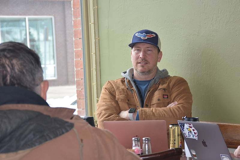 Rep. Ray "Bubba" Sorensen talks with constituents over coffee at the Olive Branch Family Restaurant in Greenfield Saturday, Feb. 15.