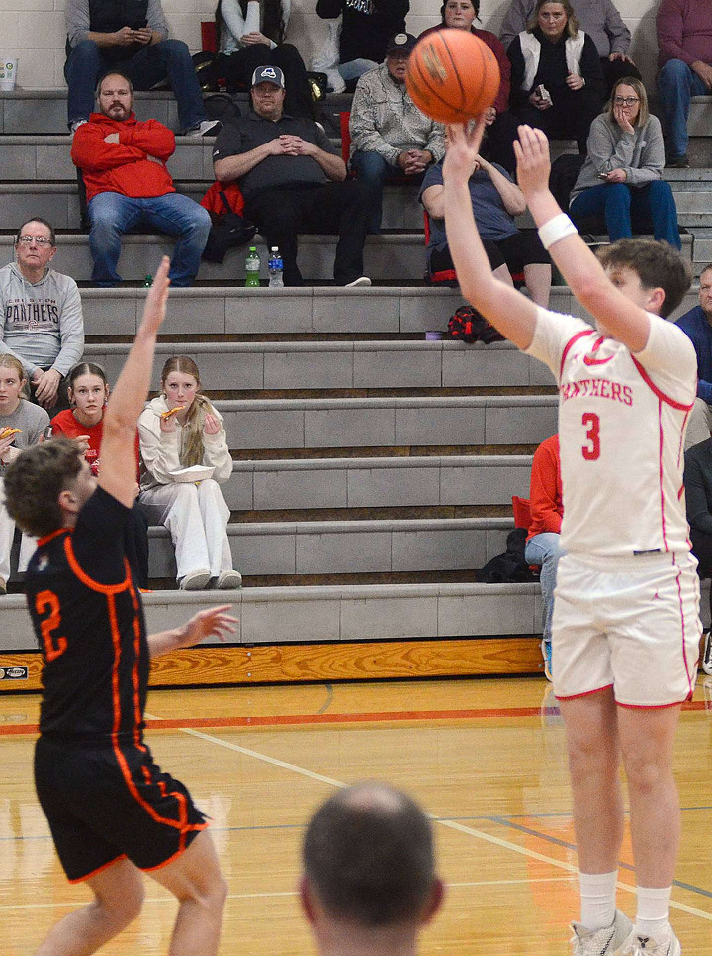 Creston's Rhett Driskell shoots a 3-pointer against Red Oak. Driskell made five 3-pointers in scoring a team-high 17 points.