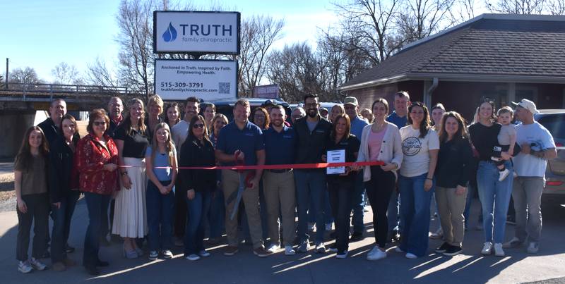 Dr. Kevin Miller and his team at Truth Family Chiropractic cut the ribbon at their new Creston office Friday, Feb. 13 with the help of the Creston Chamber of Commerce.