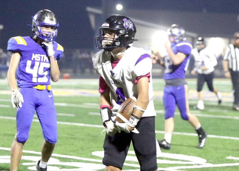 NV/OM senior Keyin Steeve celebrates a big play during last Friday's football game at Martensdale-St. Marys.