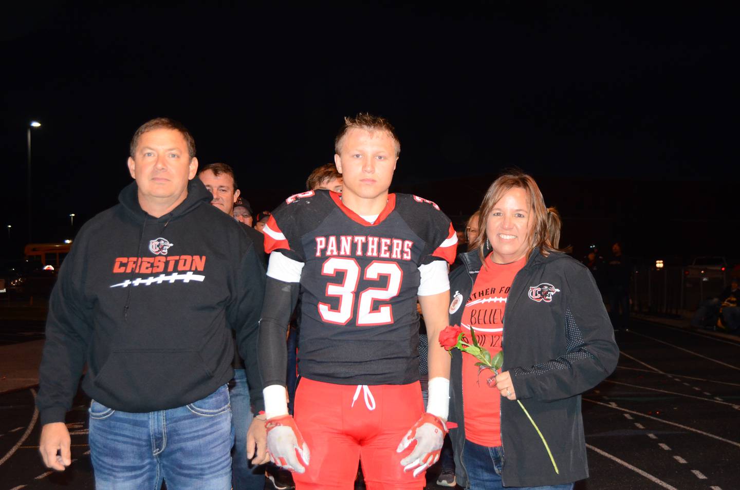 Austin Evans with parents Rob and April
