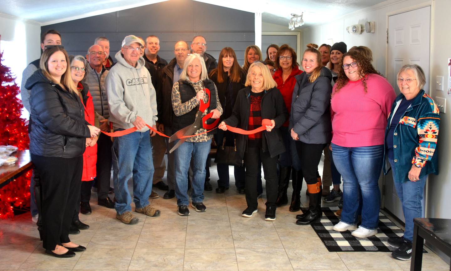 Kelly Walsh's new food delivery business Farmhouse Flavor held a ribbon cutting Thursday, Dec. 5 with the Creston Chamber of Commerce.