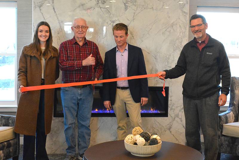 The Creston Chamber of Commerce holds a ribbon cutting for Homestead's reopening.