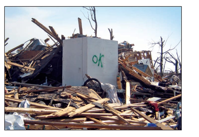 A safe room stands amid the wreckage of the 2021 Joplin, Missouri, tornado.