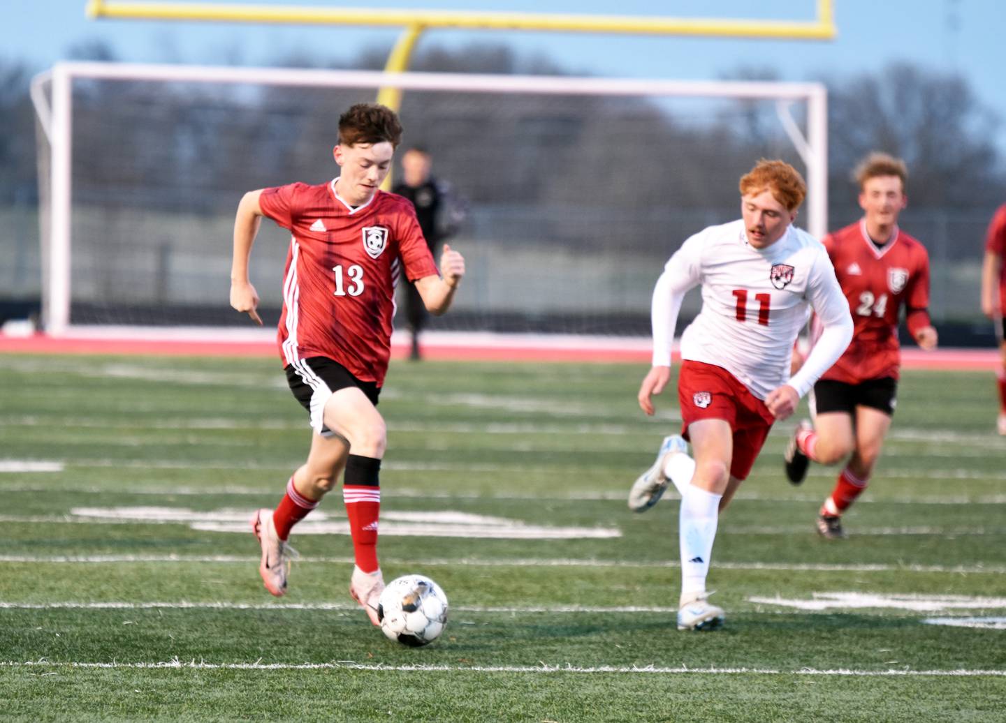Creston senior Justin Loudon carries the ball downfield Tuesday in a 4-0 loss to the visiting Chariton Chargers.