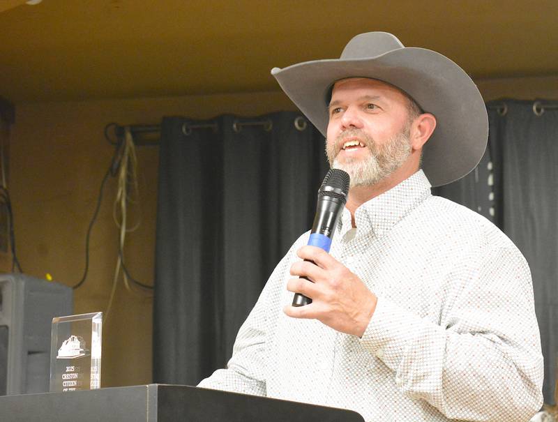 Citizen of the Year Jamie Travis speaks about the power of local community during his speech.