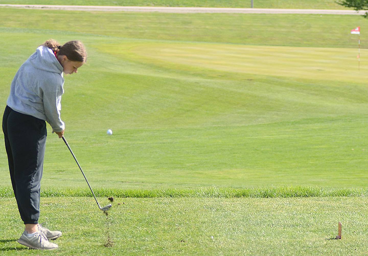 Izzy Gilbertson of Mount Ayr tees off at the par-3 No. 6 hole at Crestmoor Friday during Friday's meet against Creston. Gilbertson was runner-up medalist with a 48 behind teammate Jaylee Shaffer's one-over par 38.