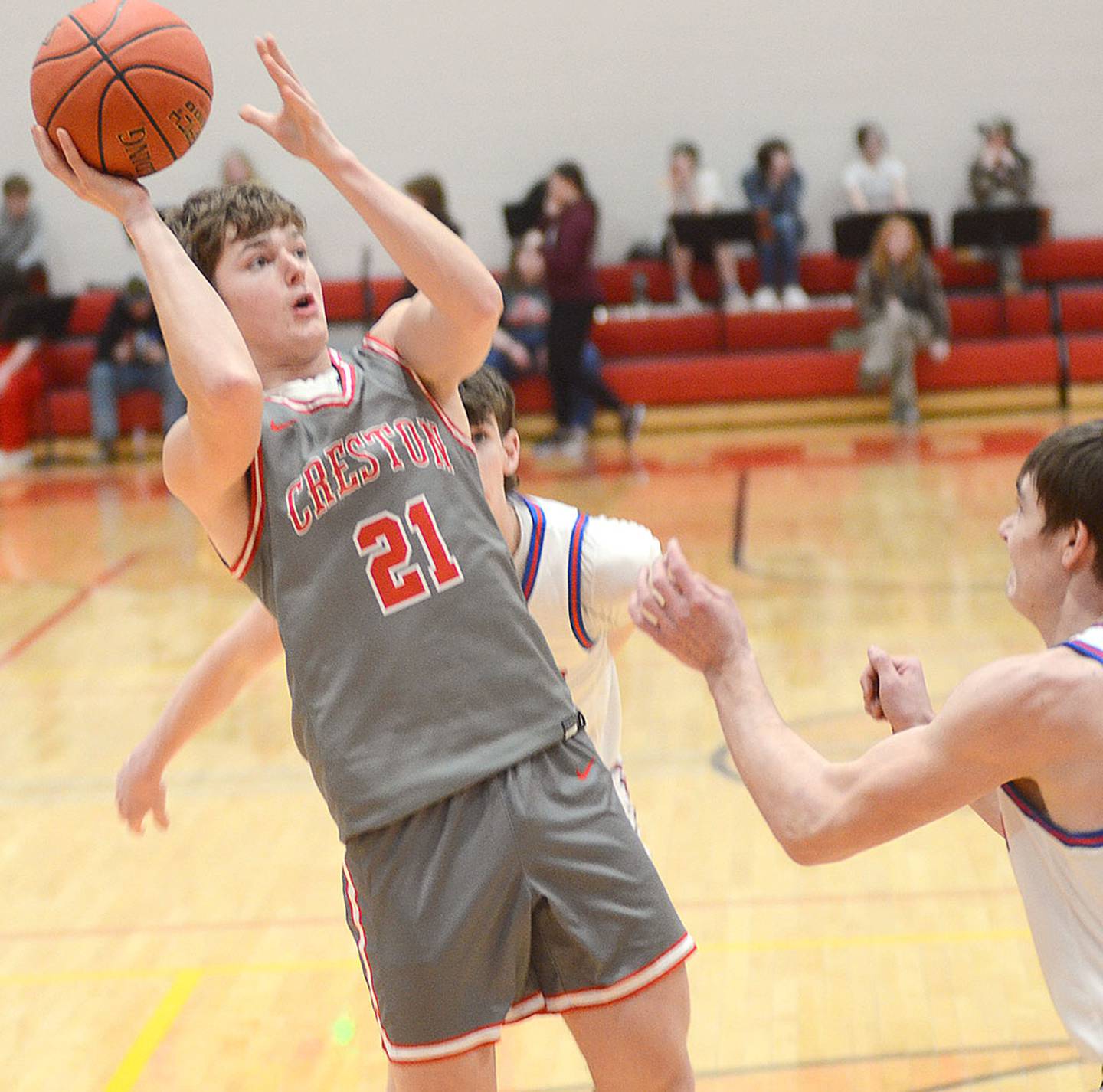 Creston senior Josh Schaefer puts up a shot near the lane against Earlham Thursday. Schaefer had seven points and five rebounds in the 55-53 win.