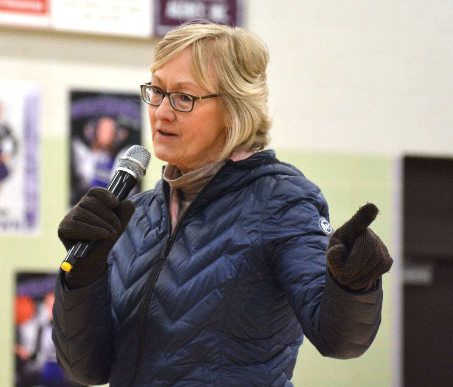 Dianne Jungmann of Greenfield speaks in support of Donald Trump at the 2024 Republican caucus in Greenfield.