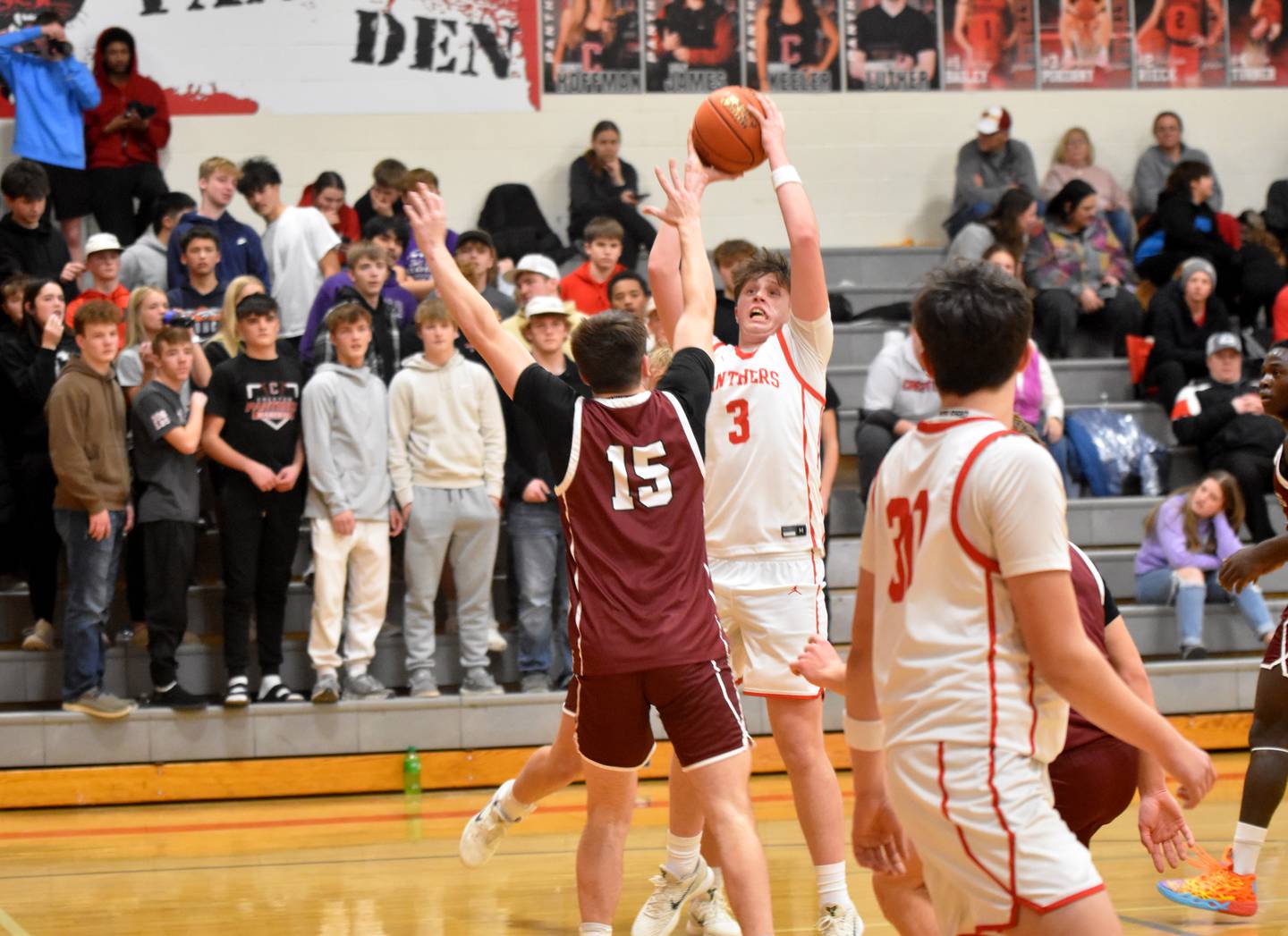 Rhett Driskell puts up a contested shot Tuesday at home. He had a game-high 25 points.