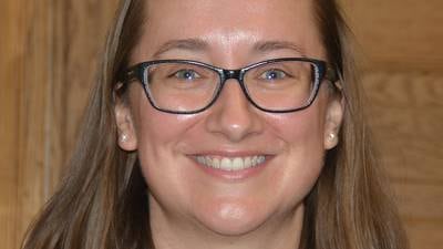 Larson goes full-time as county attorney