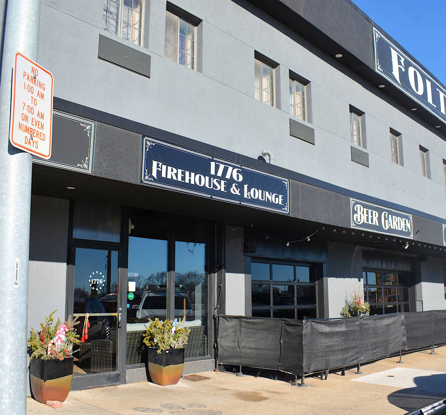 The storefront of the 1776 Firehouse & Lounge, located at 301 West Adams Street.
