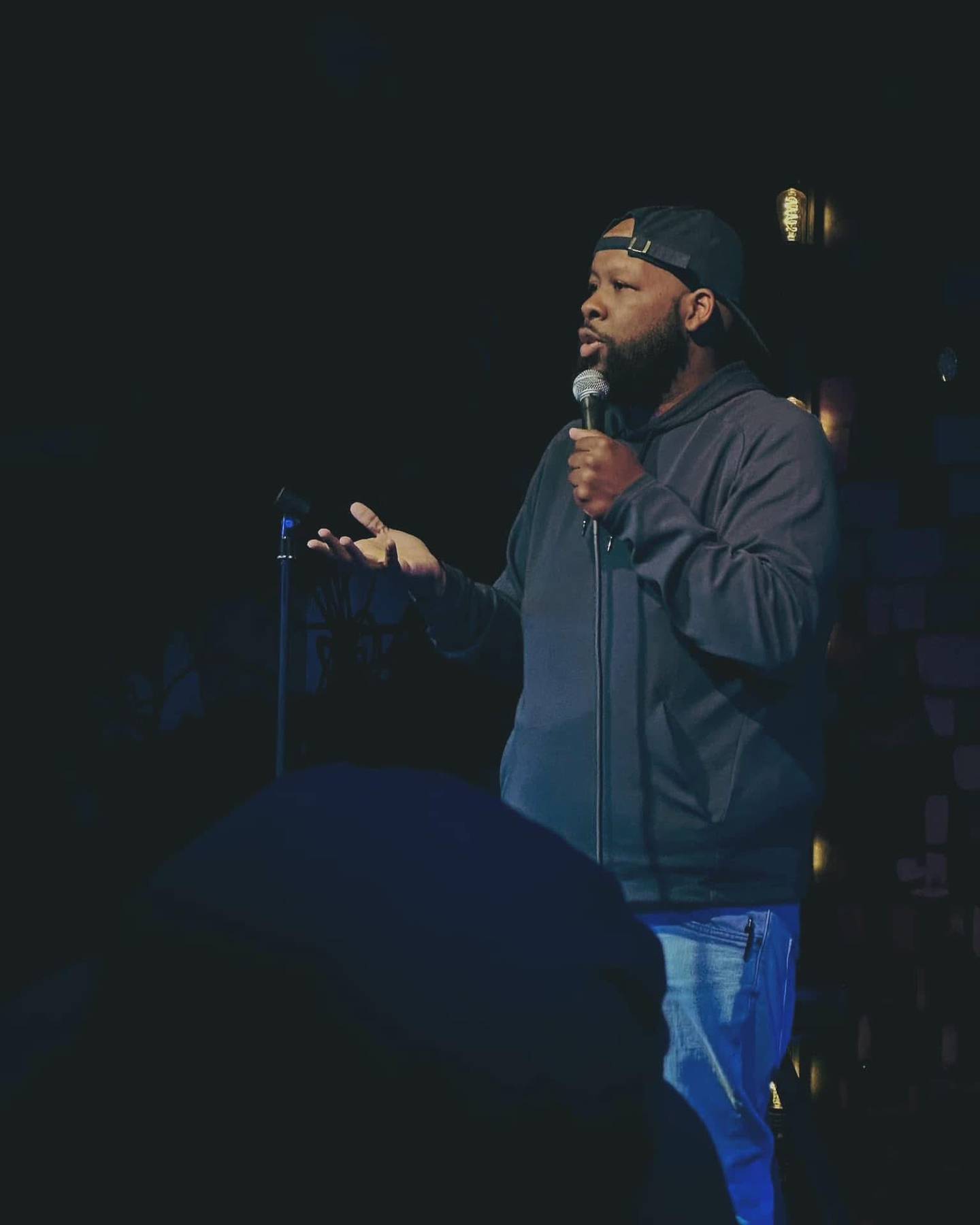 Powell draws the crowd in the middle of a stand-up performance.