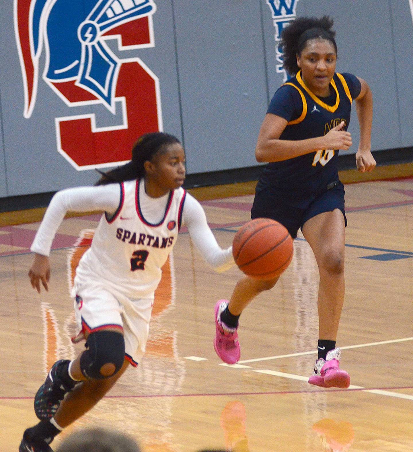 Southwestern point guard Jordyn Hall advances the ball on a Spartan fast break. Hall had four points, four assists, three steals and seven rebounds.