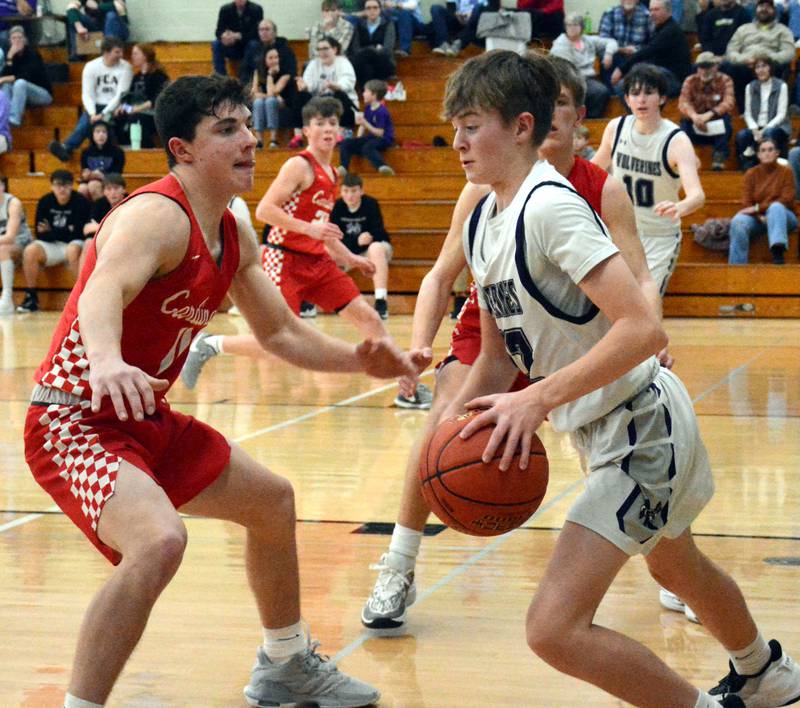 NV/OM's Ty Rardin faces pressure from a Central Decatur defender in a game Friday, Feb. 2 at Greenfield.