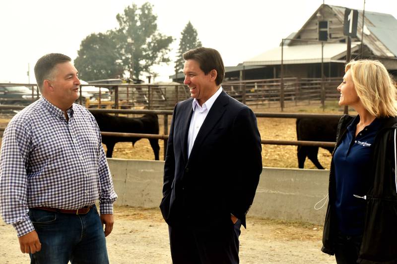 Saturday morning, Florida Governor Ron DeSantis, a 2024 presidential candidate, stopped by Balance4Ward in Nodaway to visit with Adams County farmers. The cattle feeding management company is owned and operated by Todd and Kristi Drake, pictured right and left. The stop was the governor’s 58th county visited in Iowa. He plans to visit all 99 before the caucus in January.