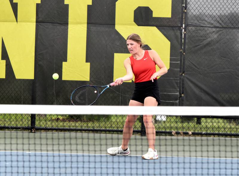 Hollynn Rieck returns a serve Friday against Atlantic. Rieck won her singles and doubles matches in the 5-1 victory.
