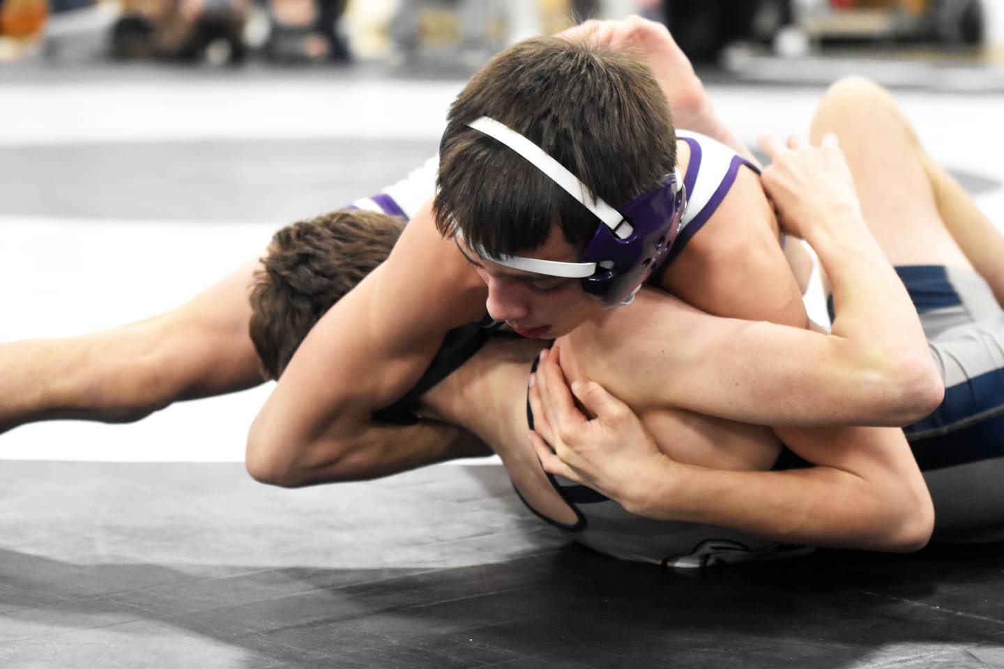 Nodaway Valley’s Josh Nelson pins Colton Hering of Riverside, Oakland in the 106-pound consolation finals.
