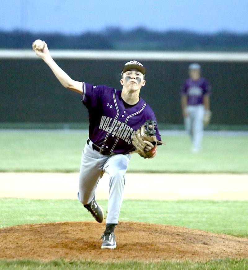 NV/OM's Ty Strode winds a pitch in a recent home baseball game against East Union.