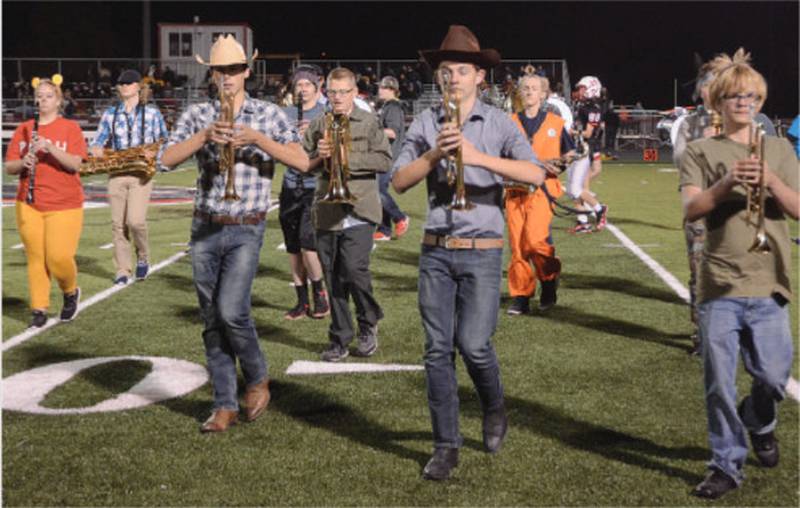 Creston Community High School marching band dressed up for its annual Halloween appearance ar Friday's season-ending football game at Panther Field. The band performed its field show that earned the school's 30th consecutive Division I rating at the Iowa High School Music Association contest.