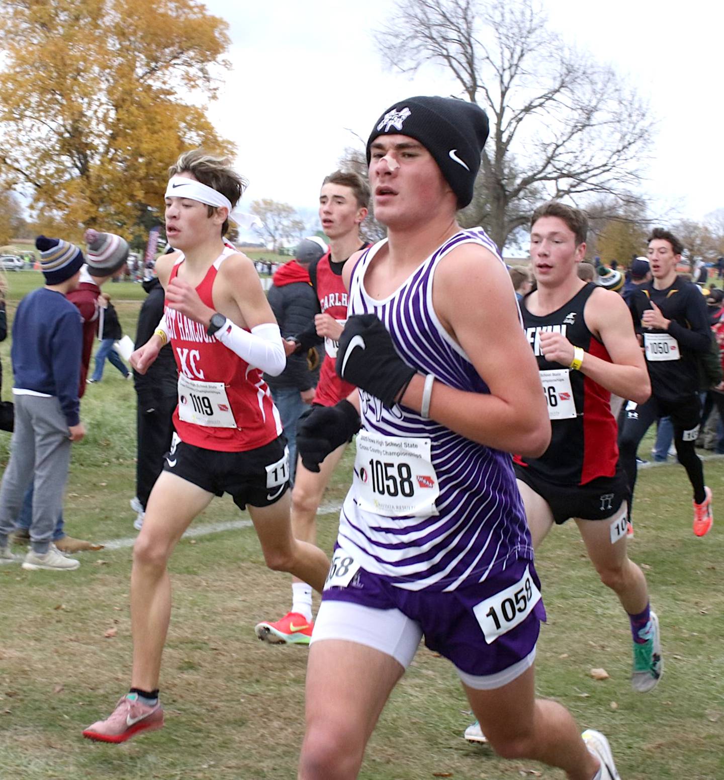 NV sophomore Gabe Winkelmann, who was 36th with a time of 17:17 at state cross country Saturday in Fort Dodge, fights through a pack of competitors in the closing stages of the race.