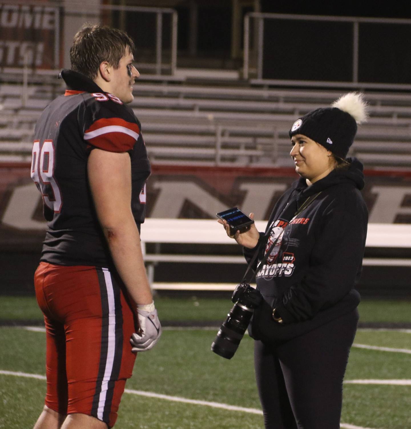 Roche interviews Max Chapman during the 2023 football season.